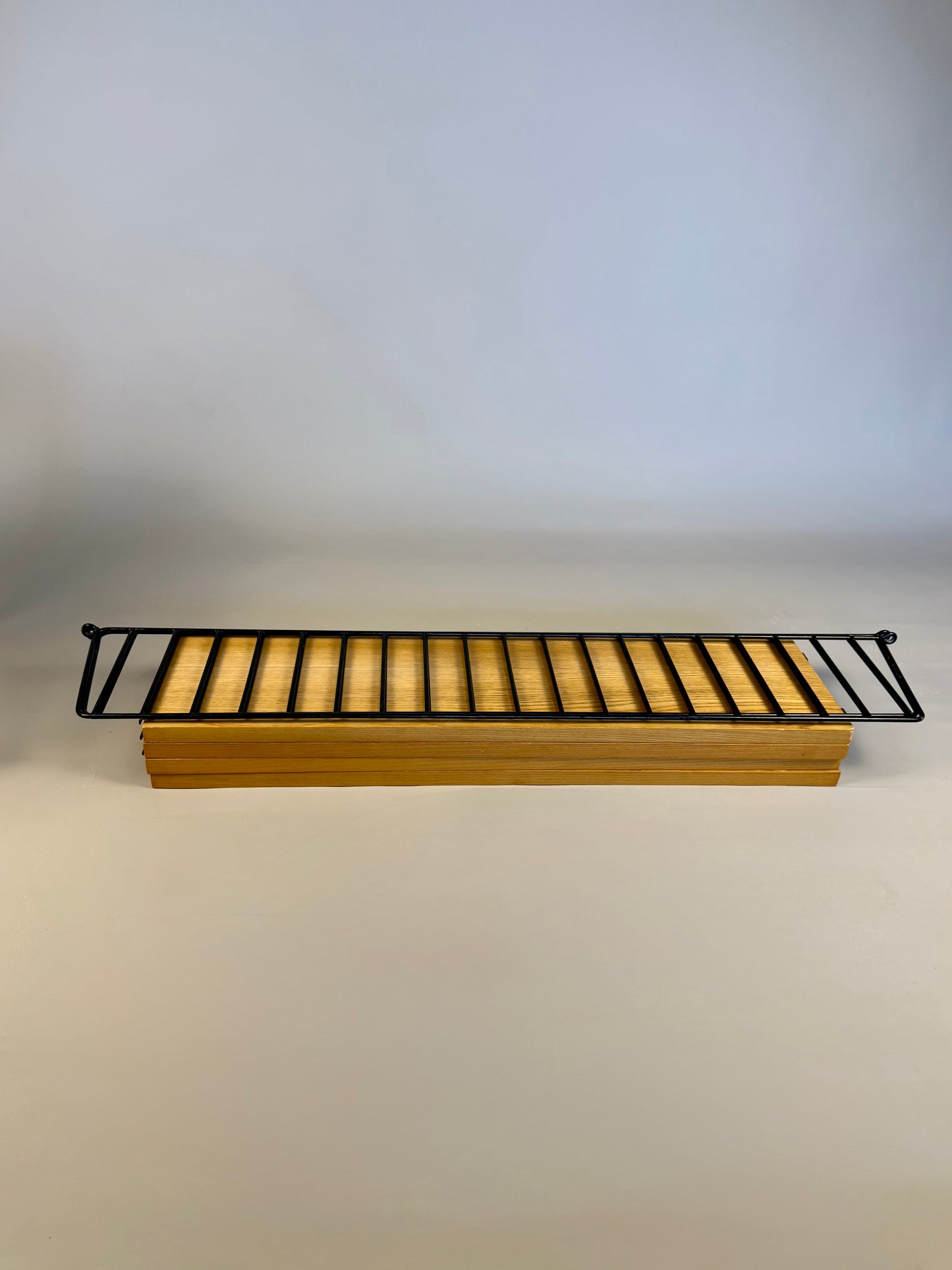 Floating wall shelf in oak veneer and black metal, 1960s