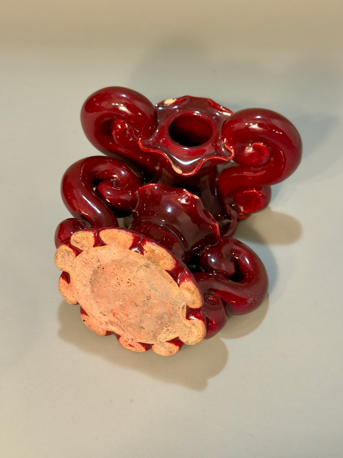 Baroque-style ceramic candle holders – glossy red glaze, vintage