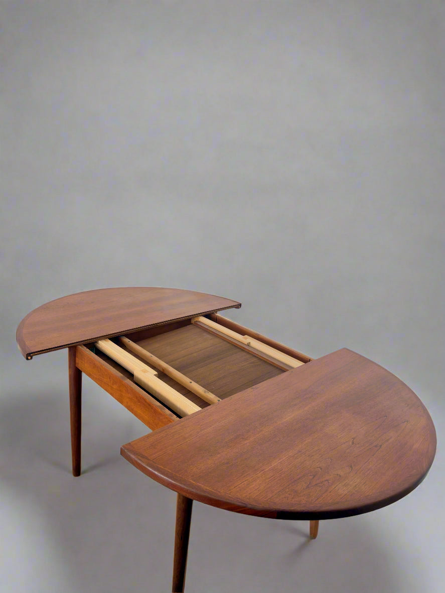 Teak round dining table with extension, 1960s
