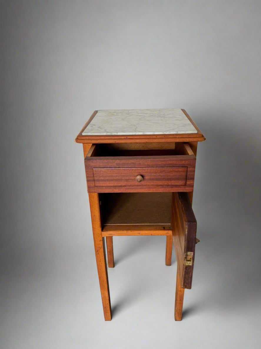 Vintage bedside table with marble top