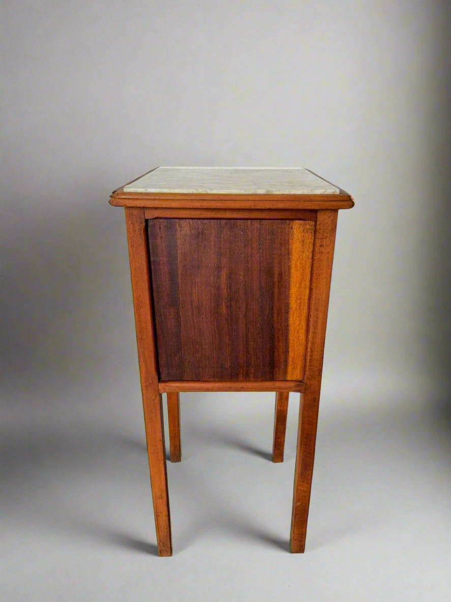 Vintage bedside table with marble top