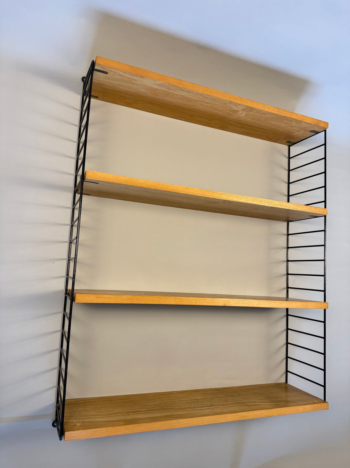 Floating wall shelf in oak veneer and black metal, 1960s