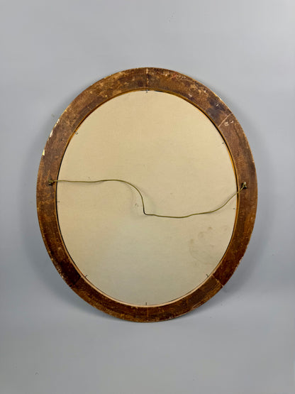 Vintage oval mirror with gold wooden frame