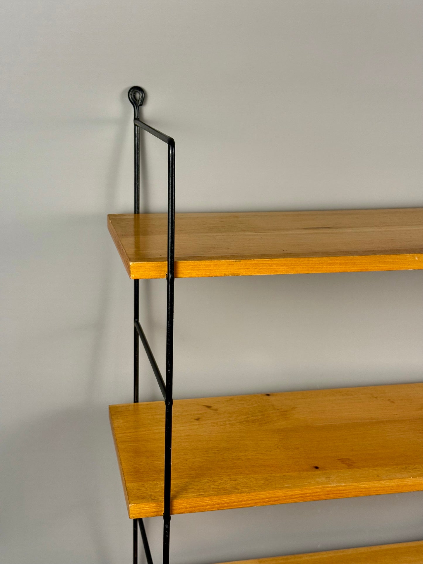 Vintage wall shelf with three wood veneer shelves