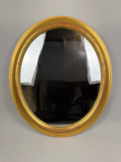 Vintage oval mirror with gold wooden frame