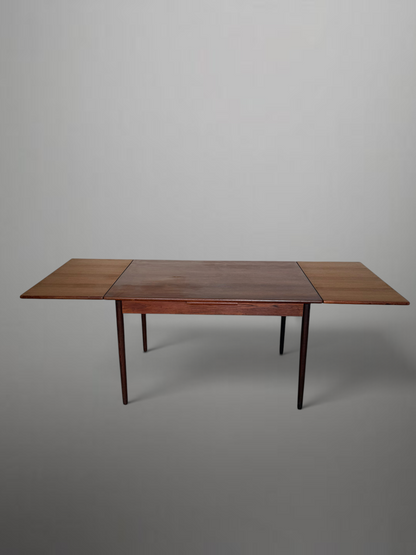 Scandinavian mid-century extendable teak dining table