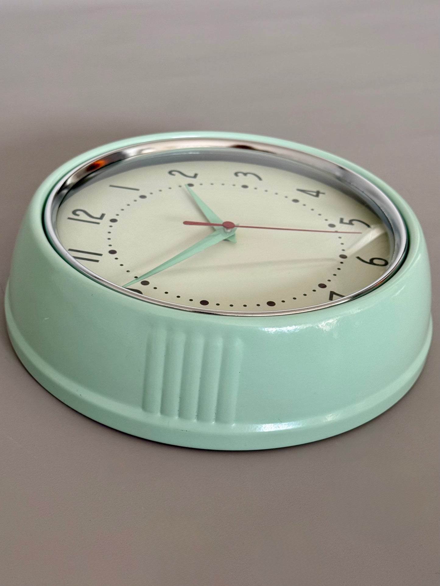 Vintage wall clock in mint green