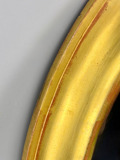 Vintage oval mirror with gold wooden frame