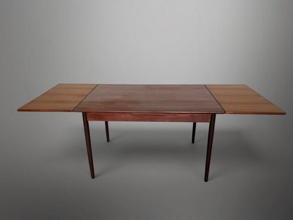 Scandinavian mid-century extendable teak dining table