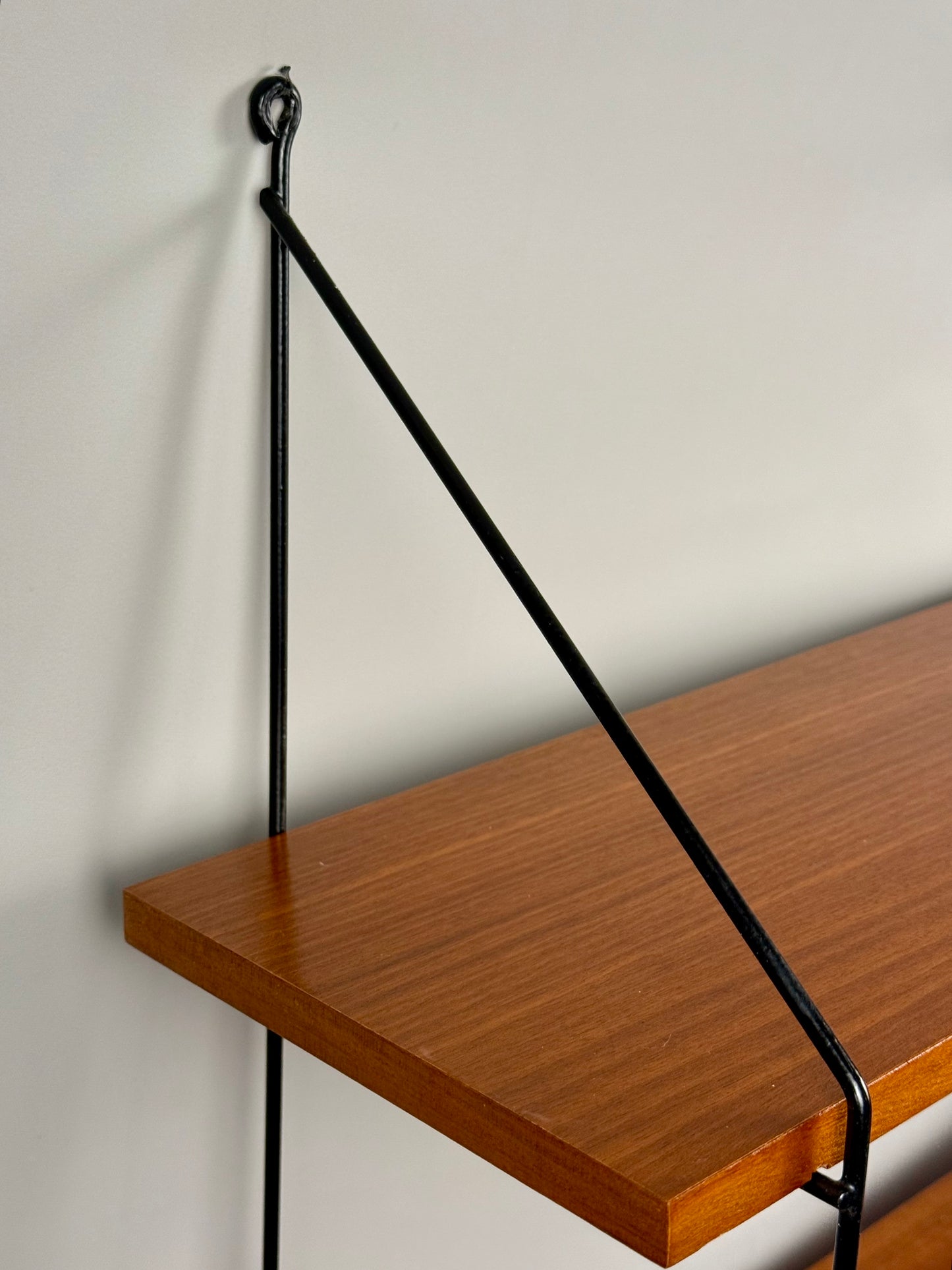 Vintage wall shelf with three teak veneer shelves