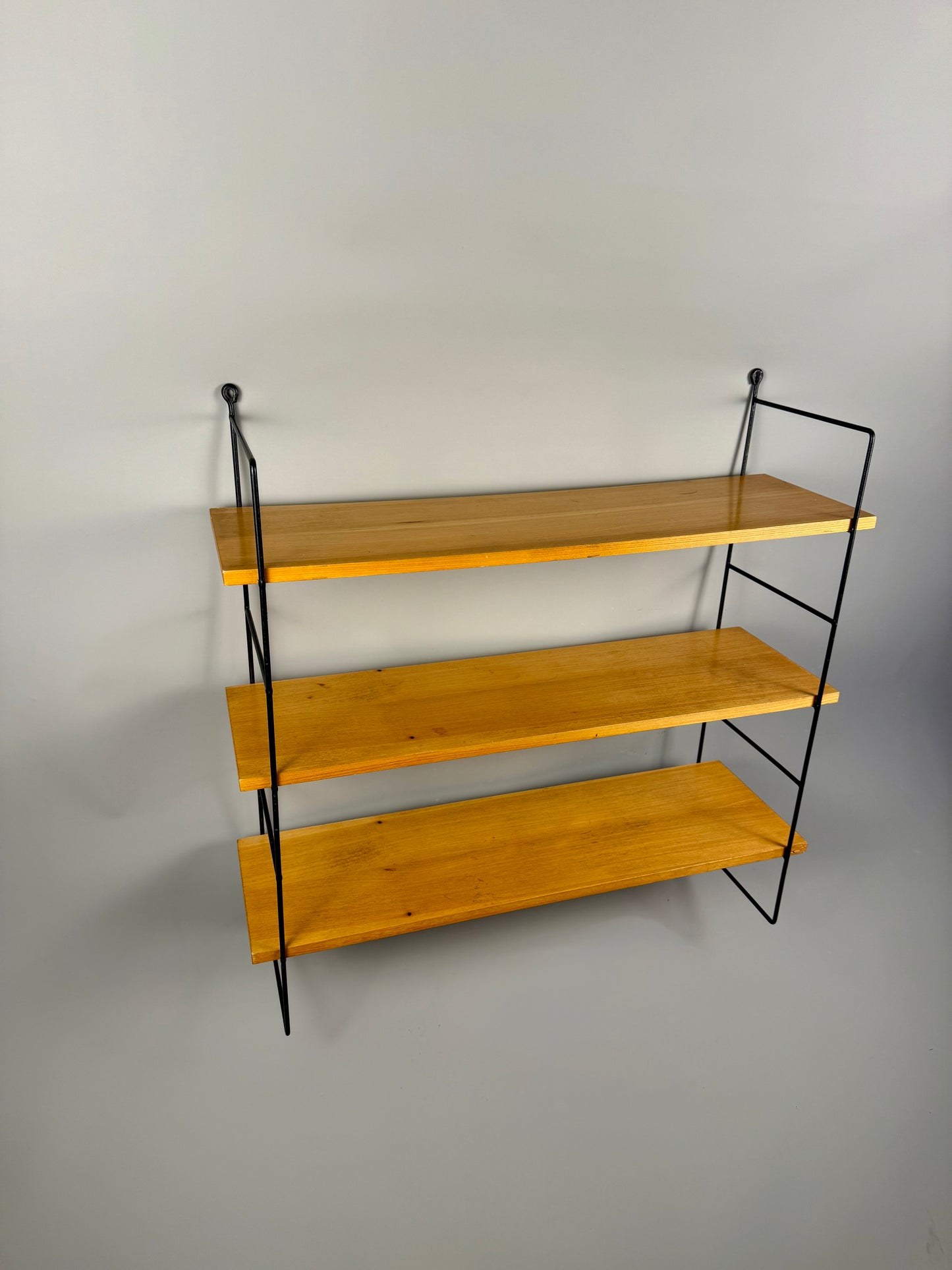 Vintage wall shelf with three wood veneer shelves