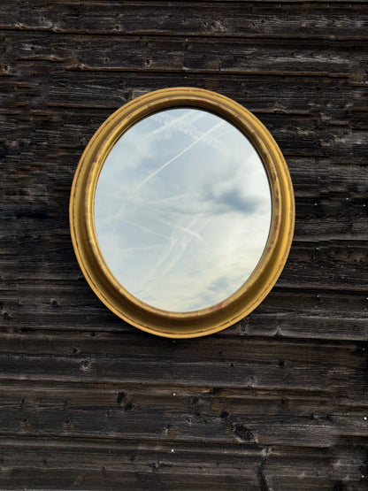Vintage oval mirror with gold wooden frame