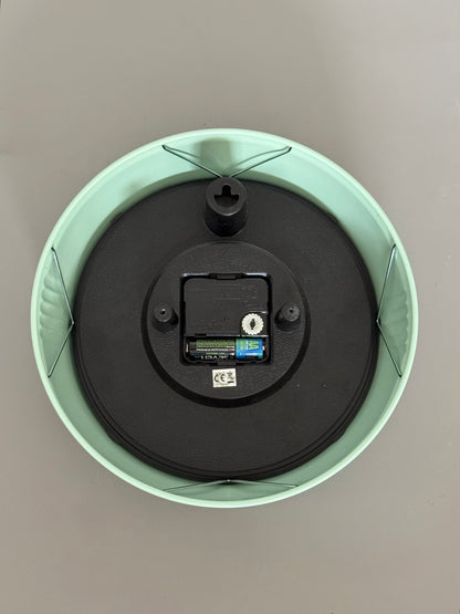 Vintage wall clock in mint green