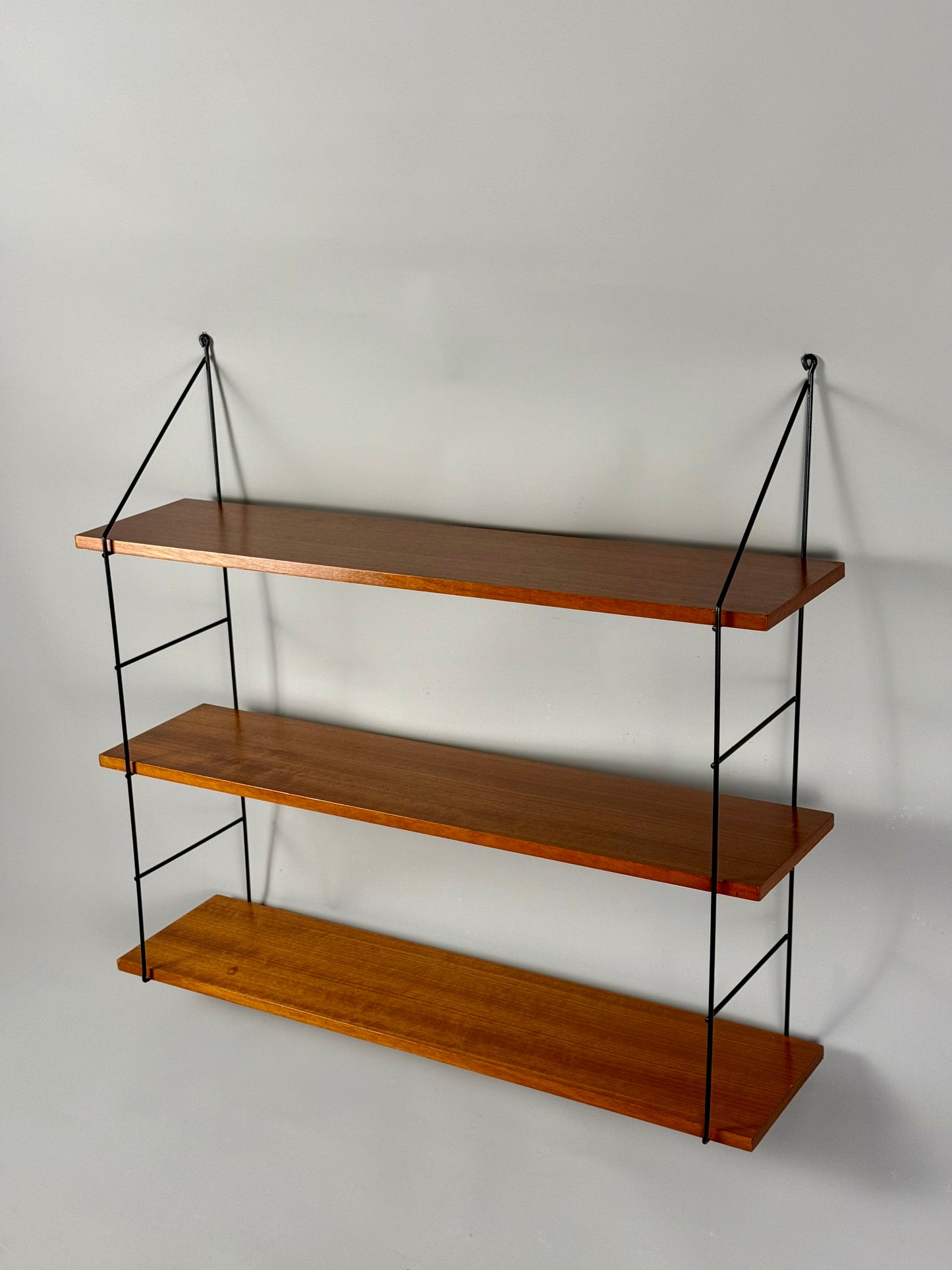 Vintage wall shelf with three teak veneer shelves