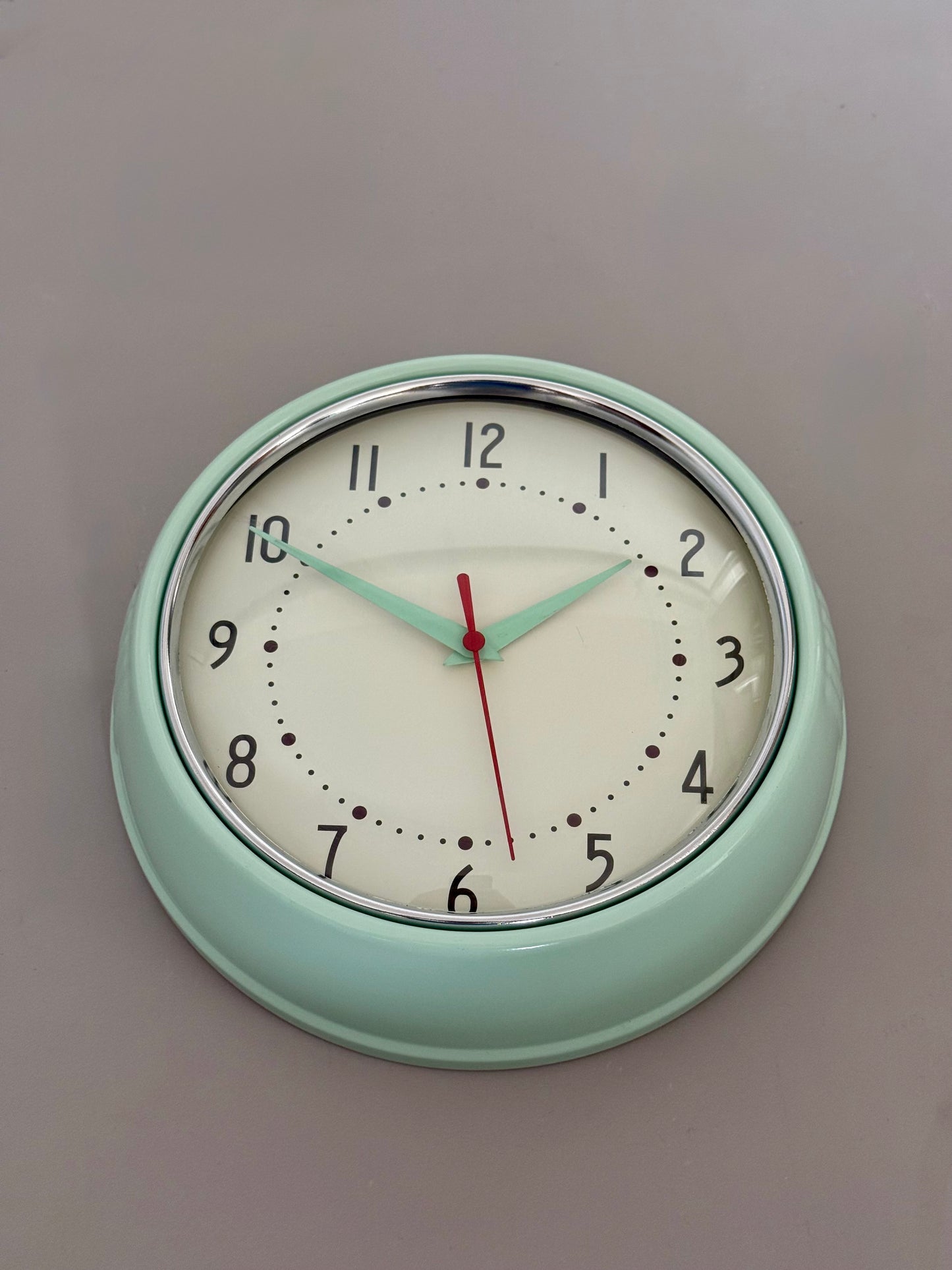 Vintage wall clock in mint green